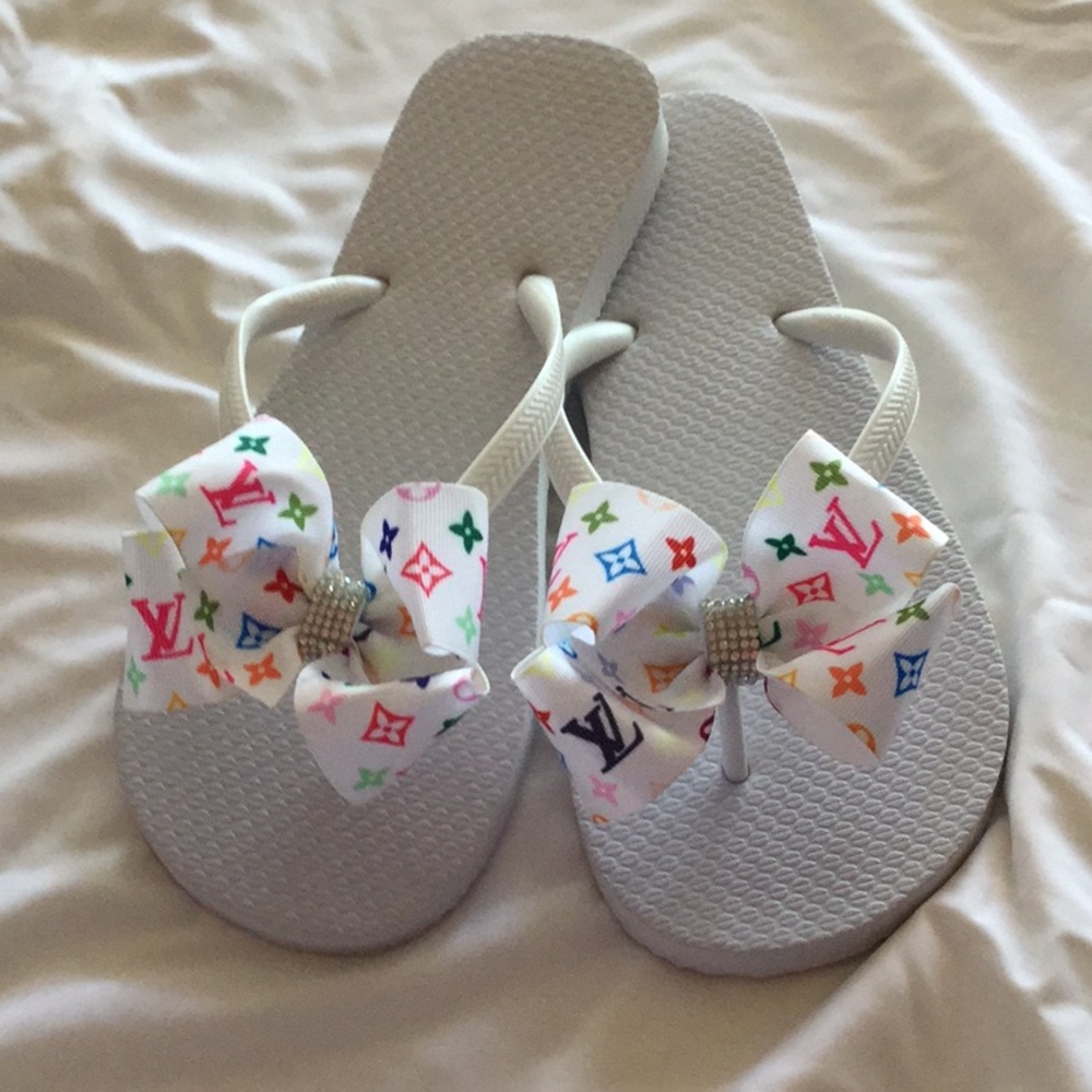 White Flip Flops w/Multi Colored Bow
